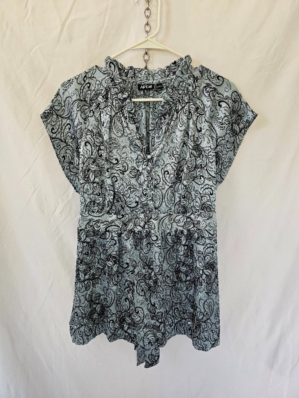 Fitted shimmery light blue blouse